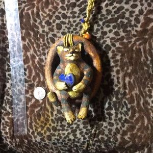 Vintage Wild earth swing’n cat sculpture